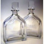 Pair of Orrefors slab sided decanters and stoppers, etched marks and 2495 to bases (4) 26.5cm high