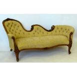 Victorian carved walnut show frame chaise longue upholstered in yellow damask on French cabriole