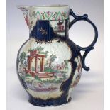 Worcester mask jug circa 1765  printed with classical ruins in puce transfer within a blue and