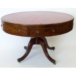 Mid 19th century mahogany drum table, the red leather top over four true and four dummy drawers,