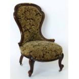 Victorian walnut spoon back nursery chair on French cabriole legs.