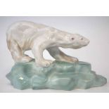 Wade figure of a polar bear modelled on a glacier, painted marks and 1939 date to base, 18cm high