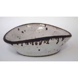 Lucie Rie (1902 - 1995) shallow studio pottery dish, impressed monogram to base, 13.5cm wide.