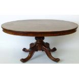 Early Victorian rosewood oval table on a turned and carved column and four spreading legs, 157 x