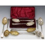 Cased pair of silver berry spoons, Birmingham 1901 and three loose  pairs of George III berry spoons