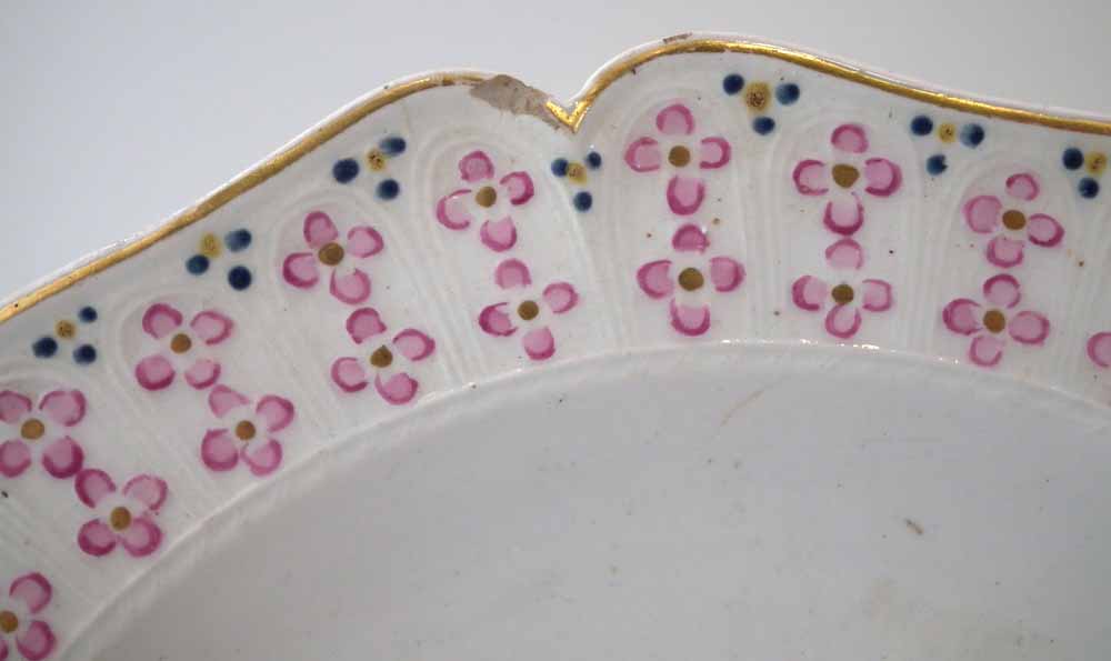 Two Chelsea plates circa 1760, painted with exotic birds within a feather and floral moulded border, - Image 4 of 9