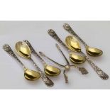 Six Tiffany & Co Patent 1884 floral coffee spoons; and a pair of Georg Jensen & Wendel sterling