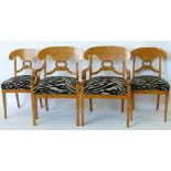 A pair of Biedermeier style satin birch armchairs and two matching single chairs upholstered in