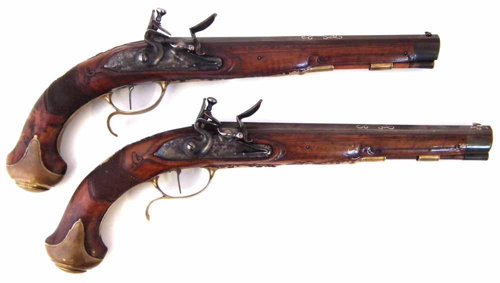 Pair of Bavarian flintlock duelling pistols, with octagonal 50 bore barrels inscribed 'Christoph
