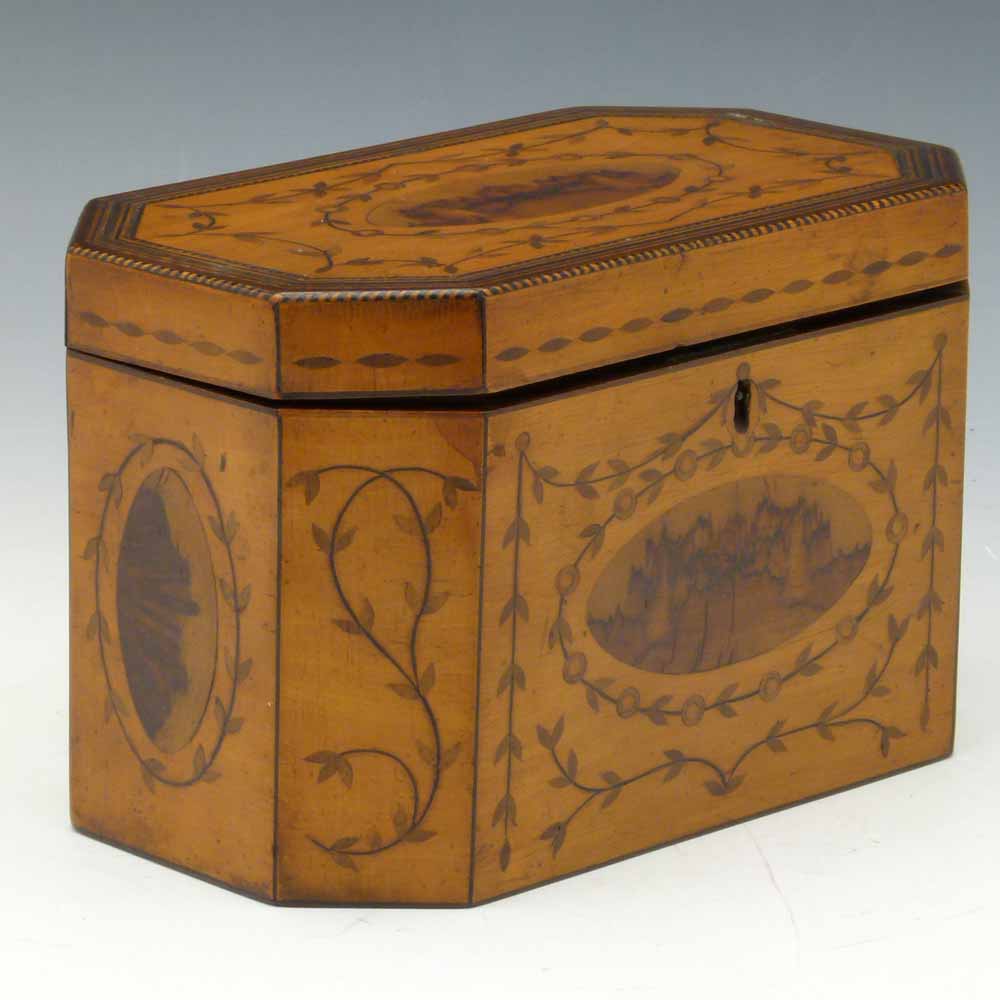 Sycamore teacaddy, early 19th  century, inlaid with trailing foliage, two interior compartments,