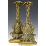 Pair of cast brass pineapple doorstops, height 34cm.