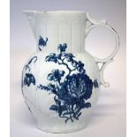 Worcester mask jug circa 1765  printed in underglaze blue with a floral prints, workman's mark to