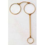 French 18K gold lorgnette (eagle's head)  maker SL, the carved frames on a plain shaft with