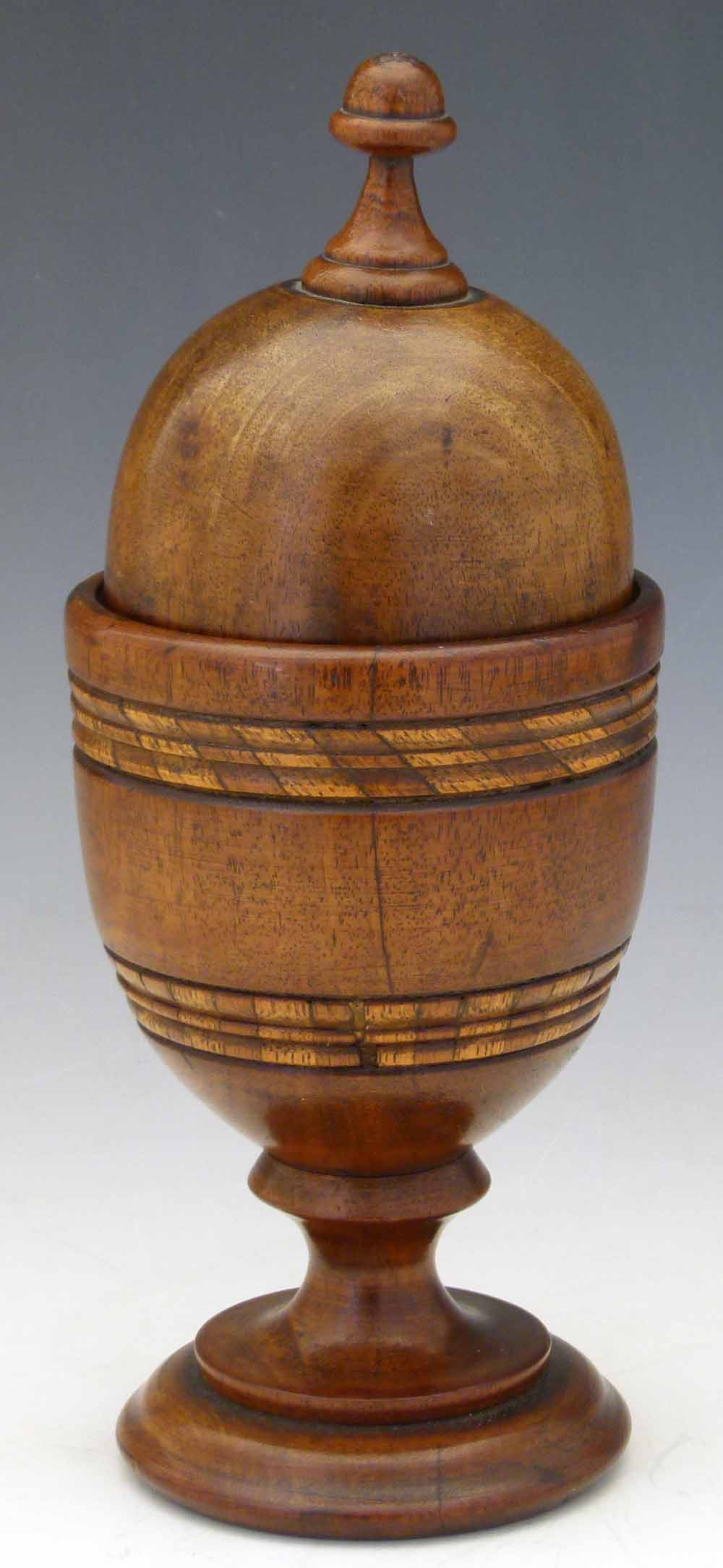 Turned wood pin cushion in the form of a cup and cover, height 25cm