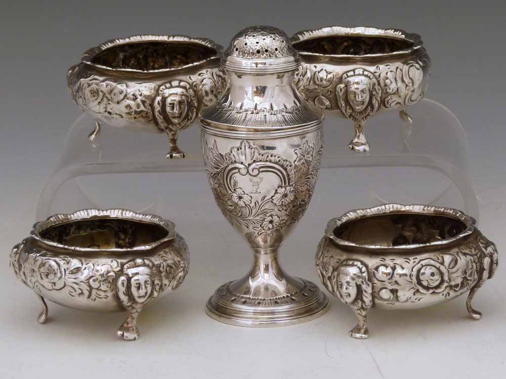 George III silver vase shaped pounce pot, James Mince, London 1791, height 12cm; four Victorian