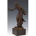 Patinated bronze standing figure of a young woman, after R Kurchler, on black marble base, overall