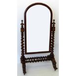 Victorian mahogany cheval dressing mirror, the arched plate on twist suports, width 85cm..