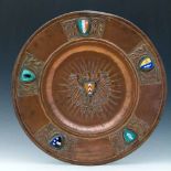 St. Albans School of Art copper alms dish applied with enamel shields, diameter 48cm.