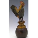 Austrian cold painted bronze study of an agitated cockerel, height 15cm, on wooden stand.