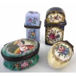 Four enamel boxes, one containing scent bottle, painted with floral sprays on coloured grounds,