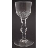 Wine glass circa 1800, with cut bowl and facetted stem and plain foot, 13.5cm high     Condition