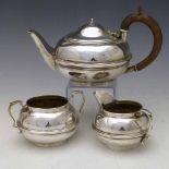 Bachelor's silver three-piece tea set, each piece with a compressed globular body, London 1862 (