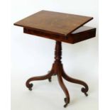 Rosewood combined writing and backgammon table, the sliding easel top revealing a fitted interior