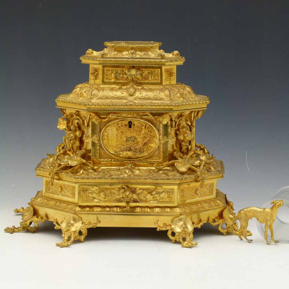 Ormolu jewellery casket in three tiers applied and moulded with naturalistic decoration, height