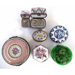 Five French porcelain boxes, two containing scent bottles, also two enamelled glass boxes, (7) the