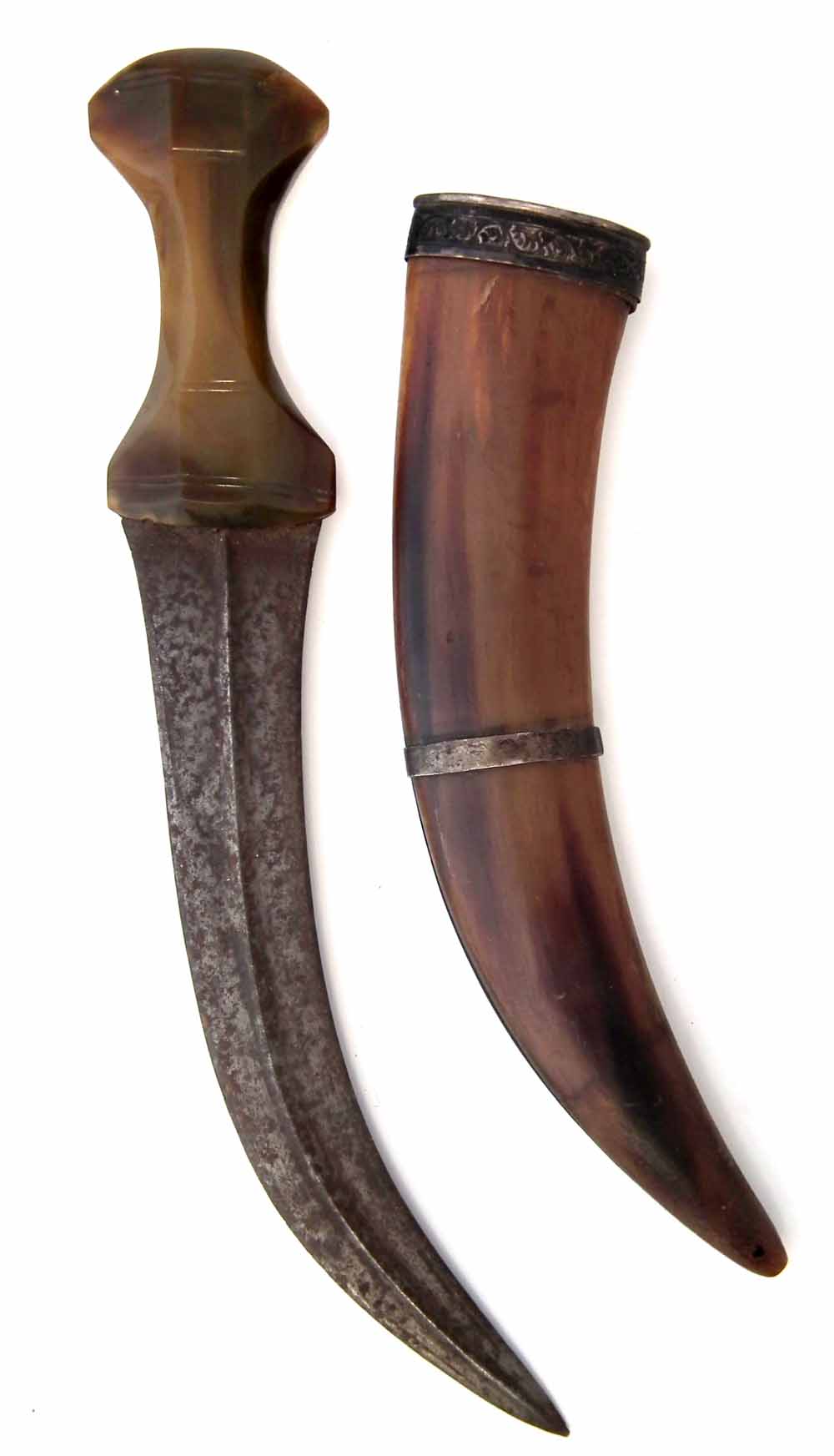 Jambiya, with polished agate grip and white metal mounted horn scabbard, 37cm overall length.