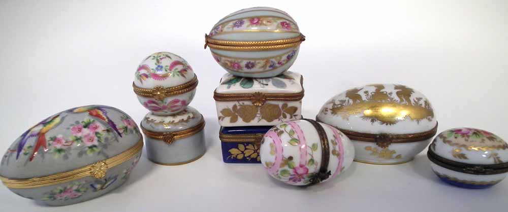 Nine Limoges porcelain boxes, including five egg shaped boxes, painted with floral patterns and - Image 2 of 4