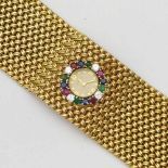 9ct gold Blancpain lady's bracelet watch, the small dial surrounded by diamonds, rubies, emeralds