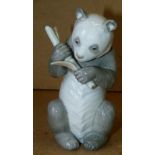 A Nao Figure of a bear holding bamboo, 1