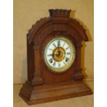 An Ansonia Clock Oak 8 Day Striking Mant