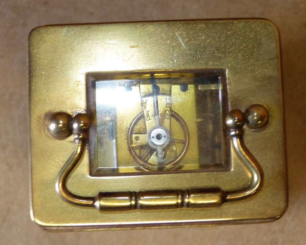 A Gilt Metal Carriage Clock having swing - Image 2 of 5