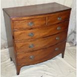 A 19th Century Mahogany Bow Fronted Chest of Drawers having 2 short, 3 long graduated drawers, with