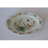 A 19th Century Oriental Oval Small Dish on white ground with multicoloured bird, floral and leaf