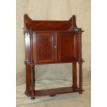 A 19th Century Mahogany Having Cabinet having 2 panelled doors with undertier on turned fluted