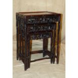 A Nest of 3 Oriental Rectangular Shaped Coffee Tables having carved fruit, leaf and bamboo