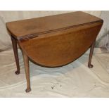 A George III Mahogany Oval Drop Leaf Dining Table on round tapering legs having pad feet, 1m 31cm x