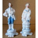 A Pair of Continental China Figures of a gentlemen and lady on blue and white ground, 13.5cm high