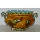 A Majolica Oval Bulbous 2-Handled Jardiniere having pierced crinkled rim on brown and blue ground