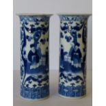 A Pair of 19th Century Chinese Round Trumpet Shaped Vases on blue and white ground having figure,