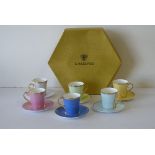 A Modern Fine Bone China "Royal Collection Faberge" Coffee Service on various coloured ground