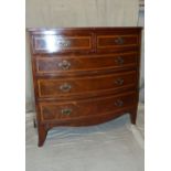 A 19th Century Bow Fronted Chest of Drawers having inlaid banding and stringing, 2 short 3 long