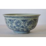 An Oriental Blue and White Round Lipped Bowl having floral, leaf and scroll decoration, 14cm