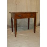 A 18th Century Walnut Side Table having quartered top with inlaid banding and stringing, 1 long