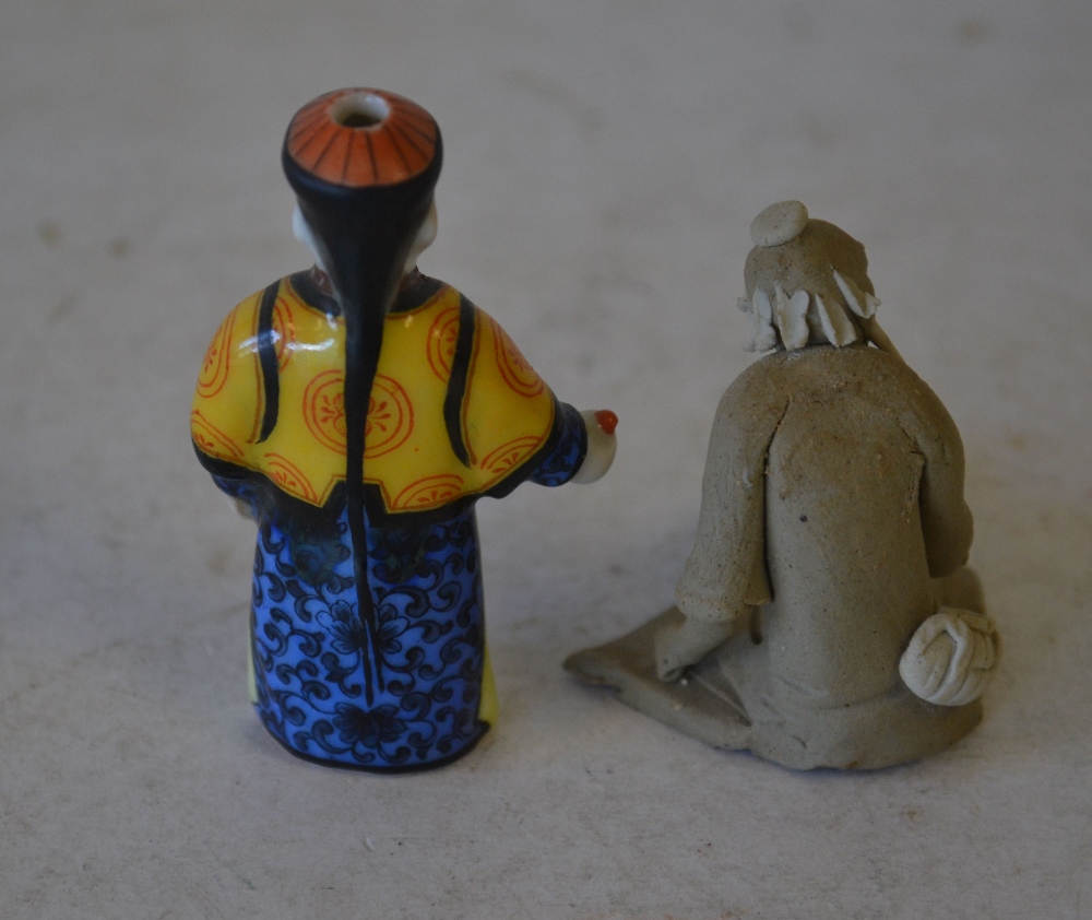 A China Snuff Bottle in form of a figure (no stopper) also a china figure of a seated oriental - Image 2 of 3