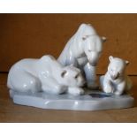 A Lladro Group of 3 Polar Bears on scalloped base,