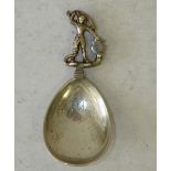 A Continental Silver Caddy Spoon having figure shape handle, 1.